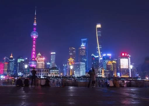 What districts are in Shanghai? Why is Shanghai called the City That Never Sleeps? What are some famous landmarks in Shanghai?