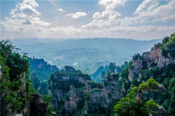 Should I visit Tianmen Mountain or Wulingyuan first on a self-driving trip from Chongqing to Zhangjiajie? 